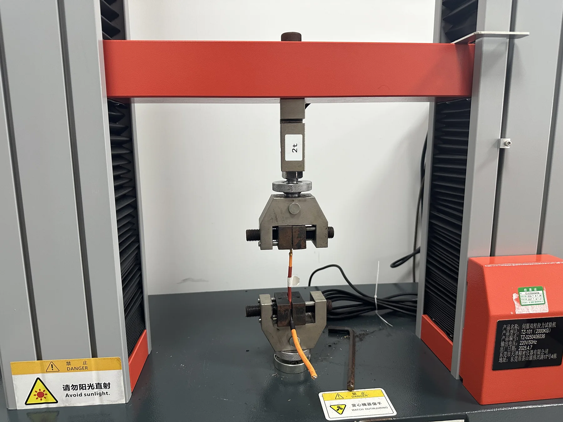 Pull-force measurement equipment testing a terminal connection